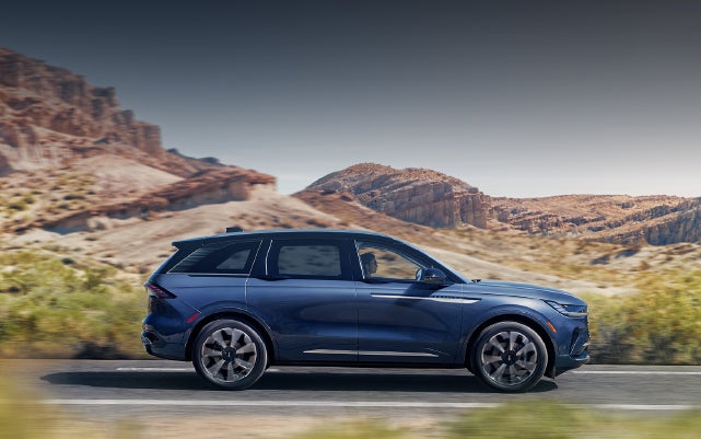 A 2024 Lincoln Nautilus® SUV is being driven in a desert setting. | Klaben Lincoln in Kent OH